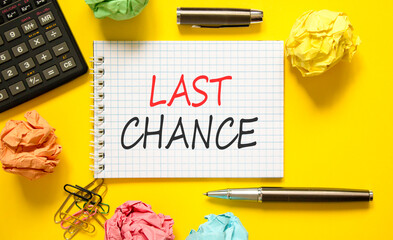 Last chance symbol. Concept word Last chance on beautiful white note. Black calculator. Black pen....