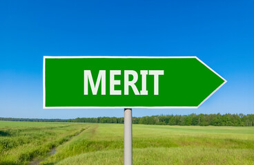 Merit symbol. Concept word Merit on beautiful green road sign. Beautiful blue sky green grass and forest peaceful nature background. Business lifestyle merit concept. Copy space.