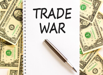Trade war symbol. Concept word Trade war on beautiful white note. Dollar bills. Beautiful dollar...