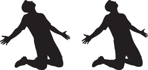 Two joyful figures kneeling in celebration silhouette