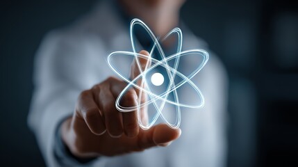 A scientist interacting with a digital atom model in a futuristic setting.