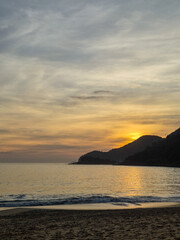 Beautiful pink sunset on a paradisiacal beach