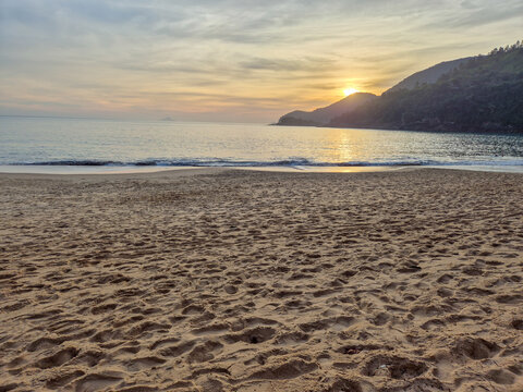 Beautiful pink sunset on a paradisiacal beach