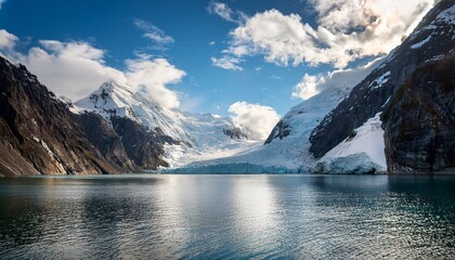 Obraz premium towering glacial cliffs meet the tranquil waters under a bright cloudy sky