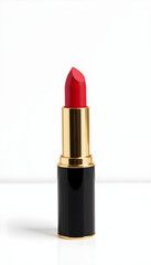 Studio shot of sleek black lipstick with pinkish-nude bullet on white background