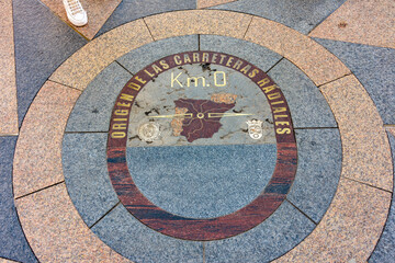 Zero kilometer on Puerta del Sol square in center of Madrid, Spain (inscription 