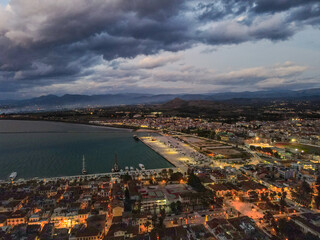 Aerial landscape city Nafplio former Greek Capitol winter sunset in Mediterranean Greece