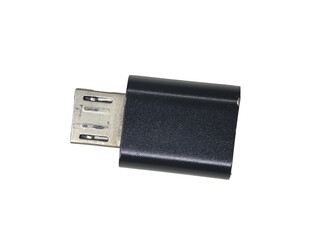 isolated macro shot of a black micro-USB to USB-A adapter, highlighting its metallic connectors and...