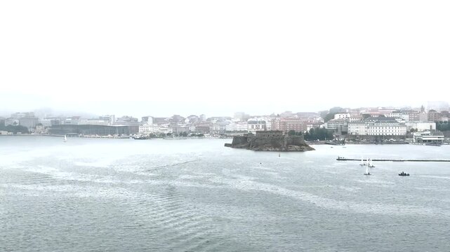 View of the Port of a Coruna with San Anton Castle and the budlings by the harbor of Galicia Spain.