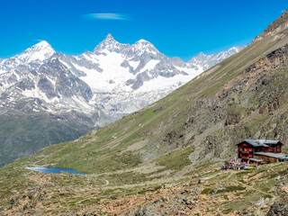 Fluhalp hut and Stelisee lake, switzerland