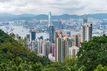 View of Hong Kong and Kowloon from Victoria peak. Panorama of Hong Kong, skyscrapers and nature.