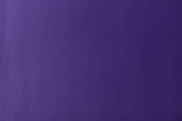 Fototapeta premium Texture of genuine leather, artificial leatherette violet, purple background