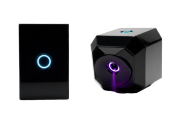 Sleek, obsidian geometric sculptures, one with azure data port, other with pulsating violet glow, on reflective white background. Concept of advanced technology