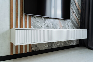 Introducing a modern wallmounted heater that combines a minimalist design, perfect for enhancing contemporary interior spaces while providing functional warmth and comfort