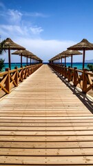 Obraz premium Wooden walkway leading to the sea