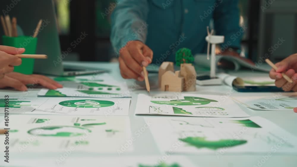 Aufkleber a dynamic team engages in collaboration within a modern office environment, analyzing green sustaina
