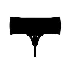 Silhouette of a public address speaker on a pole against white backdrop
