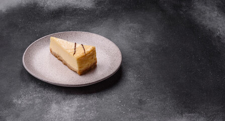 A piece of sweet New York cheesecake, dessert, cheese and vanilla pie. Classic cheesecake