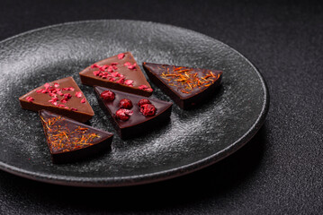 Craft home made chocolate with berries and fruits, delicious sweets. Craft chocolate