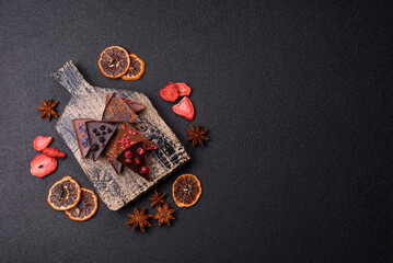 Craft home made chocolate with berries and fruits, delicious sweets. Craft chocolate
