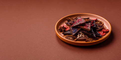 Craft home made chocolate with berries and fruits, delicious sweets. Craft chocolate