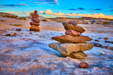 Stone Cairn Stack in Golden Hour Desert Landscape at Alstrom Point Utah