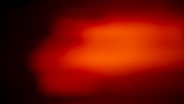 Red on black, abstract gradient blurred background.