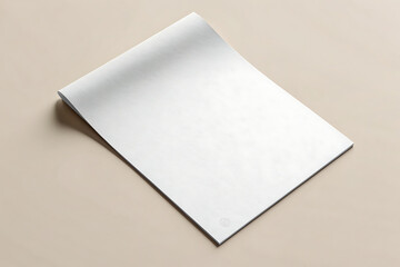 A blank white sheet of paper with a slight curl, perfect for showcasing your designs or messages on a clean and simple background