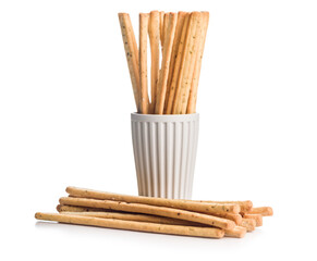 Crispy grissini breadsticks isolated on white background.