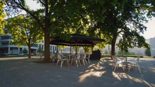 Metropolitan Coffee Shop Unoccupied Cafe Tables in City Park