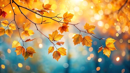 A delicate branch with golden autumn leaves bathed in warm sunlight, featuring a soft bokeh background of blue and yellow