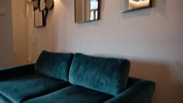 Seating Furniture and Reflective Surfaces Suspended in the Residential Entryway