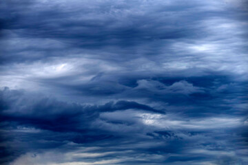 Obraz premium Dramatic cloudscape with glimpses of ligh in sky