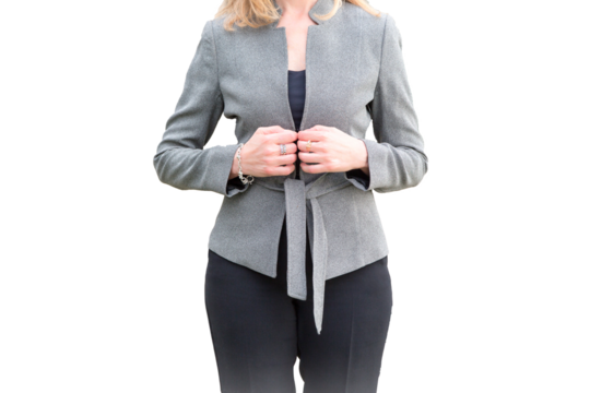Confident businesswoman adjusting her elegant gray coat in transparent background png, symbolizing leadership, empowerment, and modern professional style. Executive, manager, elegant, office, work