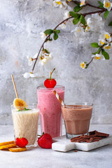 Milkshake from strawberry, banana and chocolate