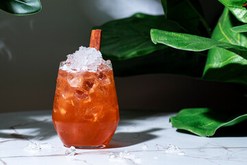 Roman holiday, alcoholic cocktail drink with italian herbal liqueur, red bitters, coffee,...