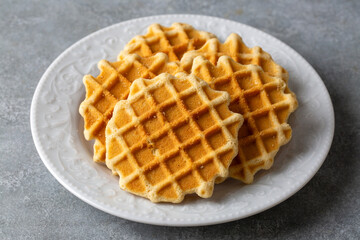 Biscuit waffle is delicious. Waffle on a plate.