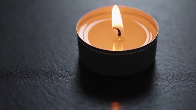 Shining Flame on Tea Light Candle