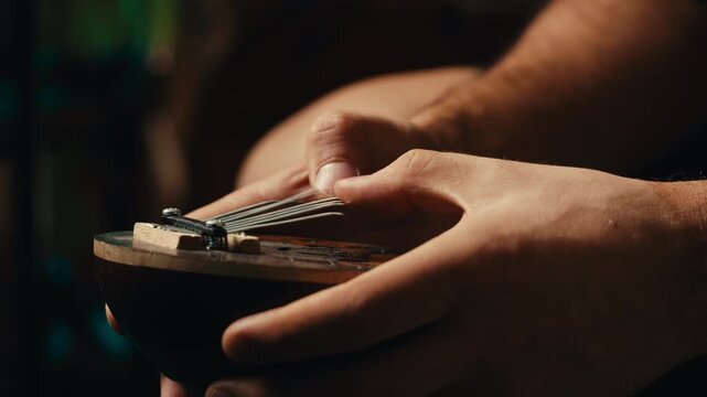 Jazz man playing on kalimba, african Hands Play music on Kalimba, Sound Recording in studio, traditional instruments.