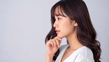 Side View of Young Woman Touching Chin – High-Resolution Portrait for Lifestyle, Beauty, and Creative Design Projects