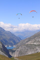 paragliding in the mountains, french alps, france, tignes