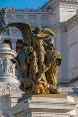 Naklejka premium The National Monument to Vittorio Emanuele II, also known as the Vittoriano or Altare della Patria: detail of the statues, Rome, Italy