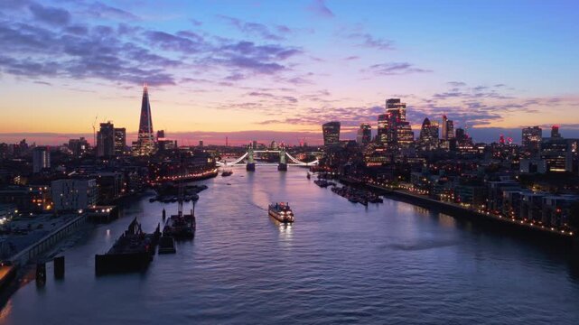 London Skyline Aerial Flythrough Over River Thames Towards Tower Bridge at Sunset