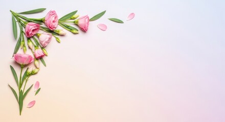 Fototapeta premium Delicate pink flowers and leaves artfully arranged in a corner design on a pastel background, creating a soft and romantic aesthetic.