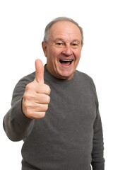 Portrait of a joyful elderly man laughing and giving a thumbs up, expressing happiness and positivity against a clean white background