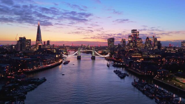 London Skyline Aerial Flythrough Over River Thames Towards Tower Bridge at Sunset