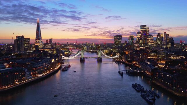 London Skyline Aerial Flythrough Over River Thames Towards Tower Bridge at Sunset