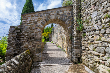 Naklejka premium La Laupie, in the Drôme department, Auvergne-Rhône-Alpes. Little city in southeastern France, La Laupie is a picturesque medieval village perched on a hill, with renovated houses and flowery alleys