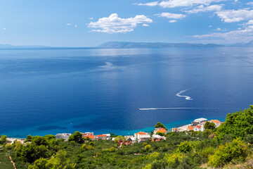 Stunning panoramic view of the Adriatic Sea coast in Dalmatia, Croatia, with a coastal village and...