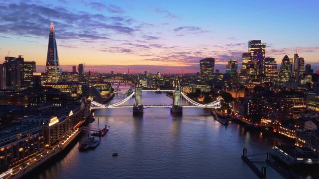 London Skyline Aerial Flythrough Over River Thames Towards Tower Bridge at Sunset